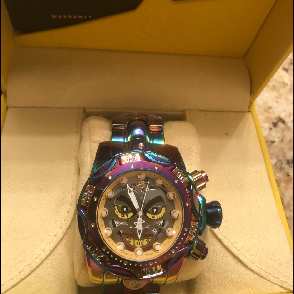 Invicta. Watch joker face.